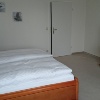 Doppelbett mit Fernseher